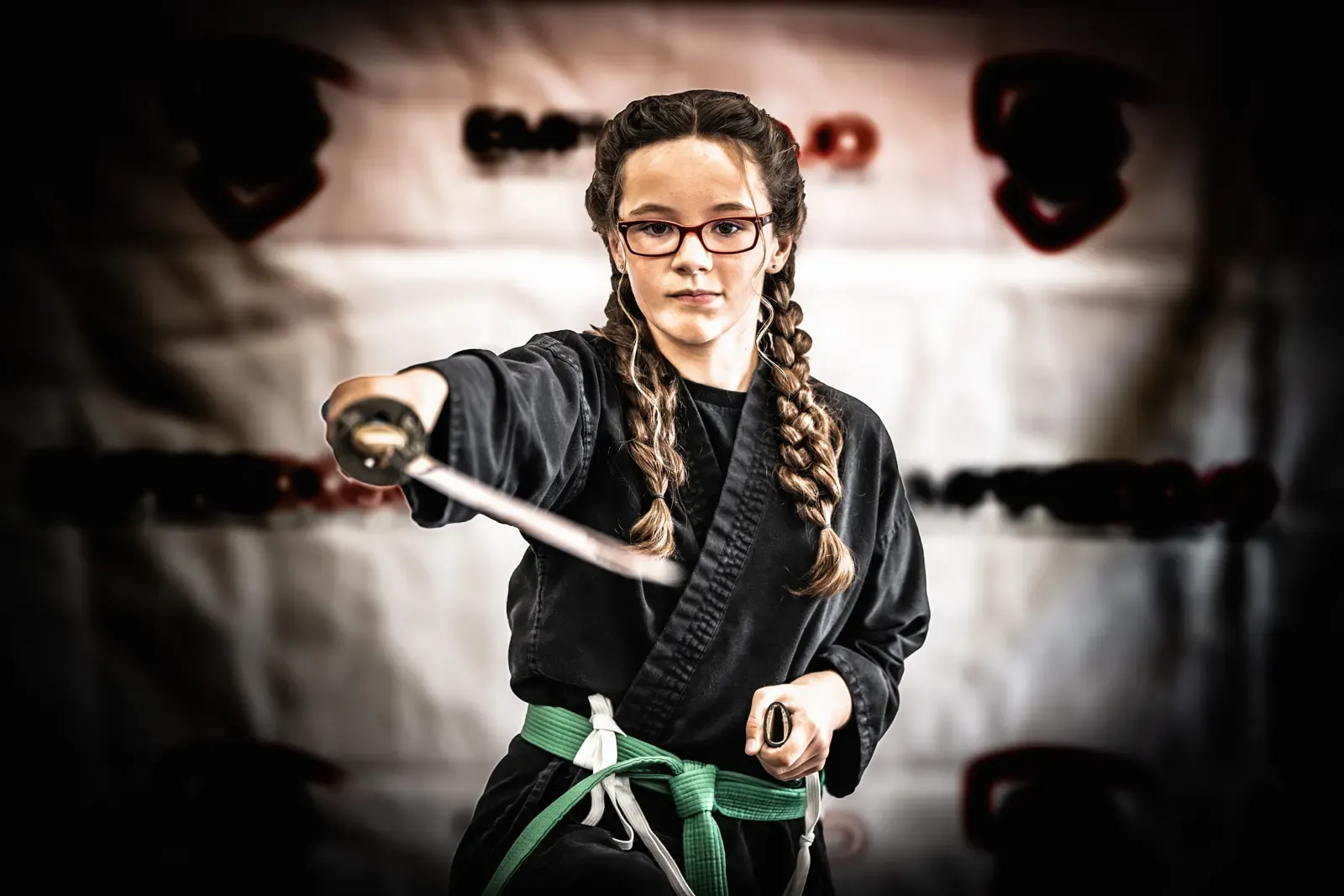 Empire Dojo student training with a katana in Abingdon, MD