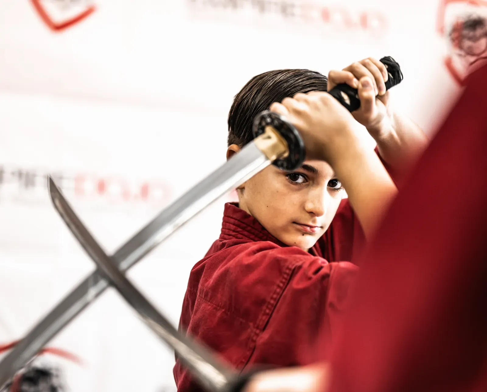 Teen jujutsu student with a katana